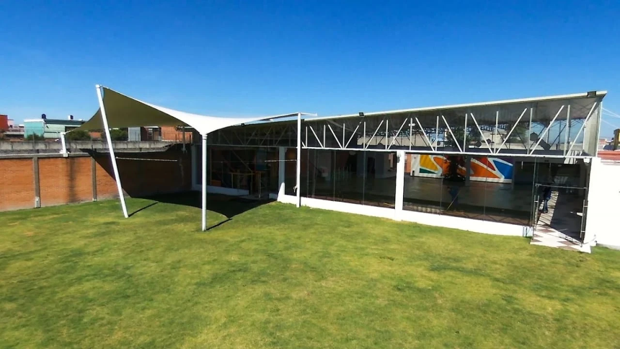 Jardín techado de Mirema con lona blanca en Naucalpan de Juárez